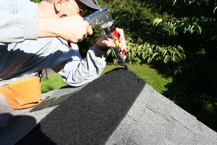 Man Repairing Roof